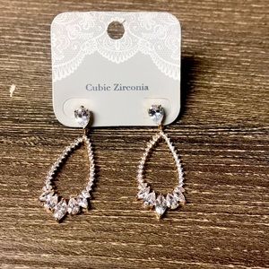 Cubic Zirconia dangling earrings in rose gold.